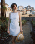 AZURIERA Cecil Dress | Textured Cotton Summer White Dress - Adjustable Back Ties & Bateau Neck.