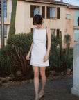 AZURIERA Cecil Dress | Textured Cotton Summer White Dress - Adjustable Back Ties & Bateau Neck.